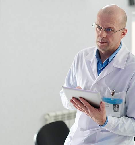 Man working on tablet looking at screen